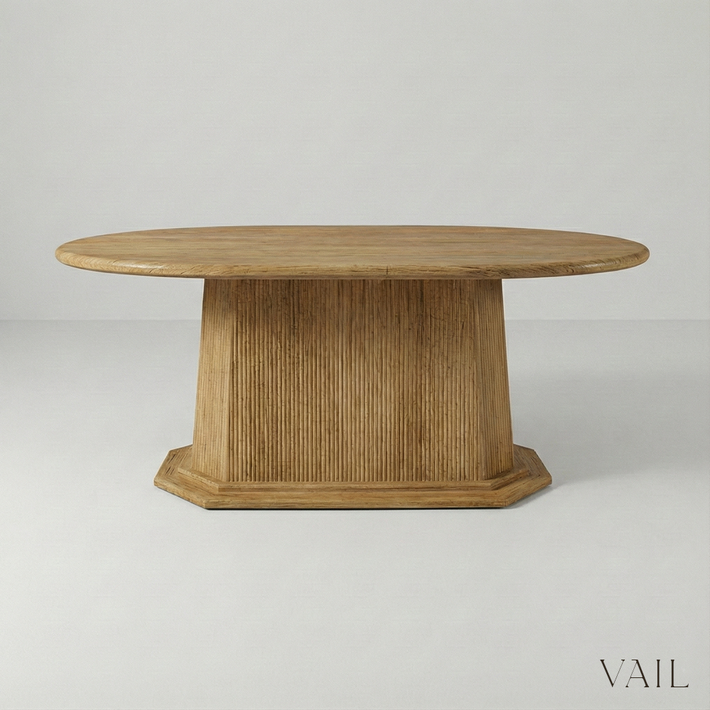 Wooden dining table on a light gray background with 'VAIL' branding.
