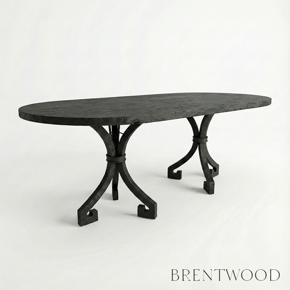 Black oval dining table with decorative legs on a white background, branded 'Brentwood'.