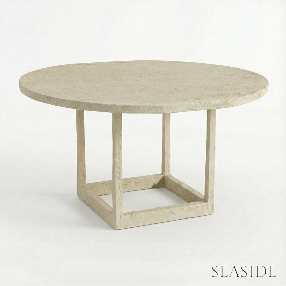Round beige table with a minimalist design on a white background, labeled 'Seaside'.