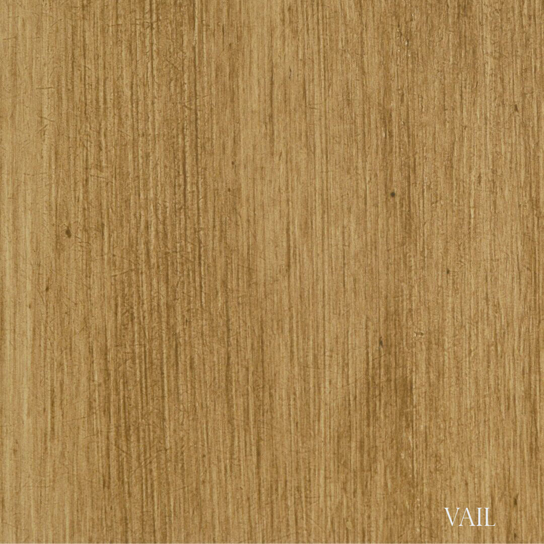 Textured brown surface with 'Vail' branding